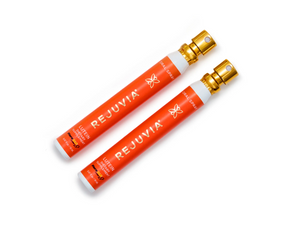 Two Rejuvia oral lutein dietary supplement spray on a white background