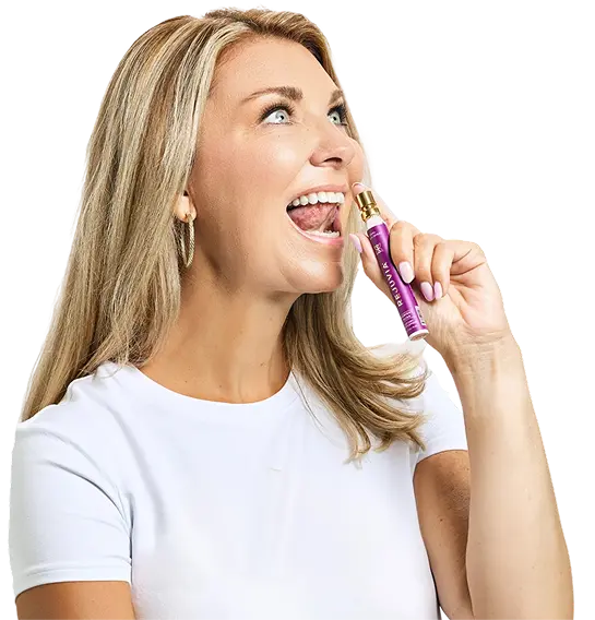 woman using rejuvia spray